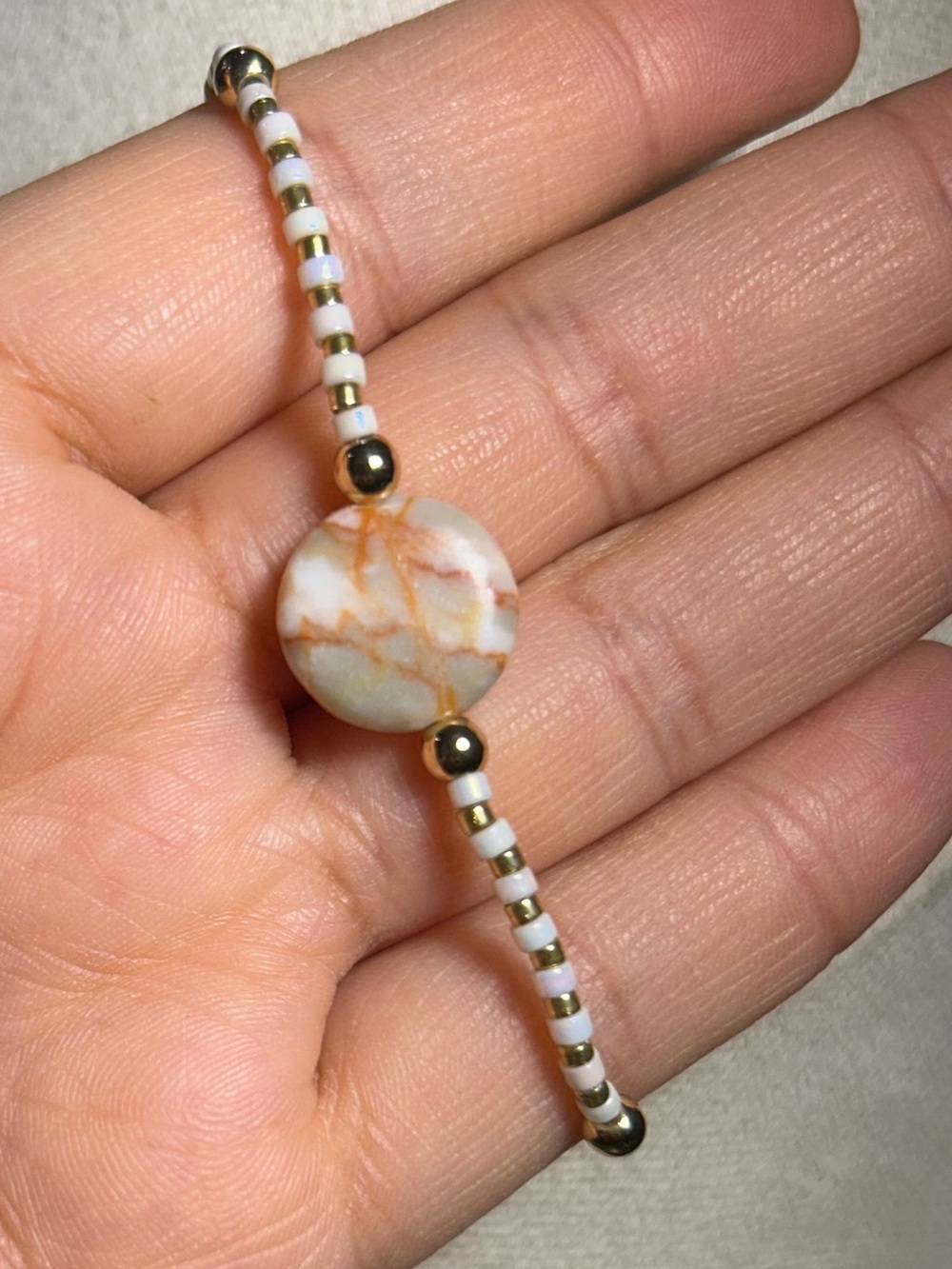 Handmade White and Peach Beaded Bracelet with Marble Accent